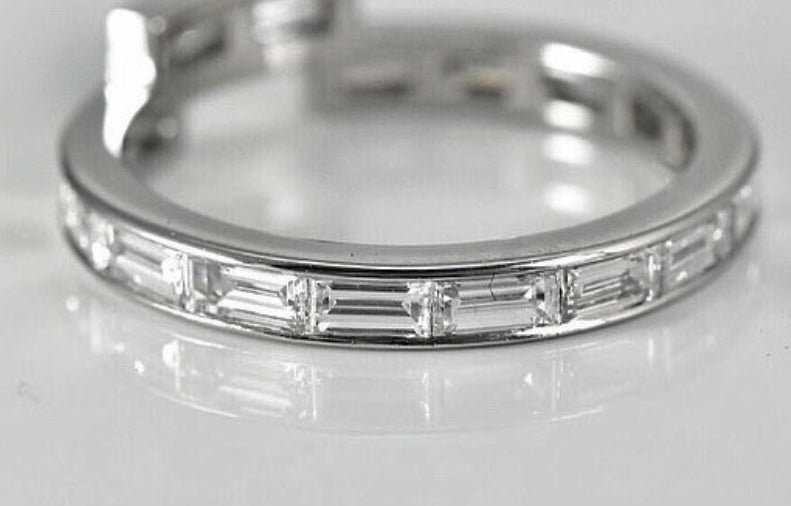 Jewelry image from page: Cushion Cut Halo Engagement Rings